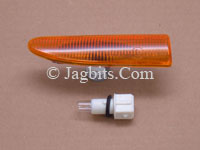 TURN SIGNAL AND SIDE MARKER LAMP, AMBER, IN FENDER BY DOOR, LEFT SIDE.  C2S3046