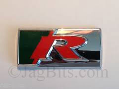 R EMBLEM ON BACK OF ALL S-TYPE SUPERCHARGED MODELS.  XR837159